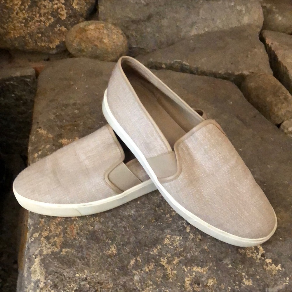 Slightly worn slip on sneakers